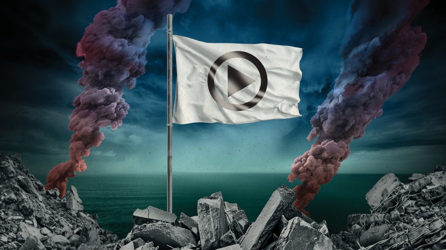 A white flag with a play button standing in ruble