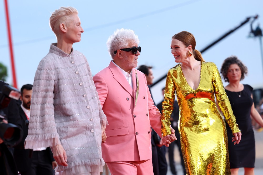 VENICE, ITALY - SEPTEMBER 02: (L-R) Tilda Swinton, Pedro Almodovar and Julianne Moore attend the "The Room Next Door" red carpet during the 81st Venice International Film Festival on September 02, 2024 in Venice, Italy. (Photo by Vittorio Zunino Celotto/Getty Images)